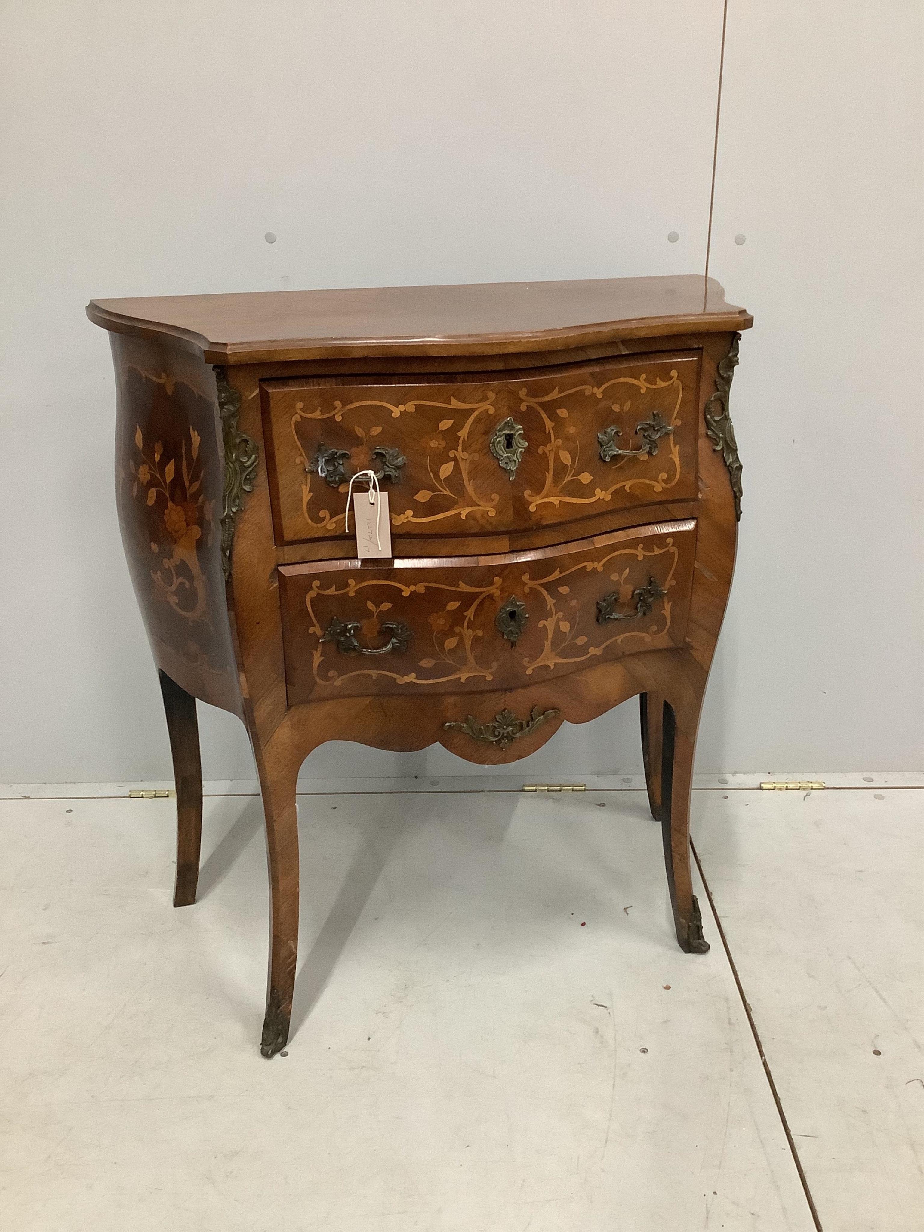 A small Louis XVI style marquetry inlaid two drawer bombe commode, width 79cm, depth 37cm, height 85cm. Condition - fair